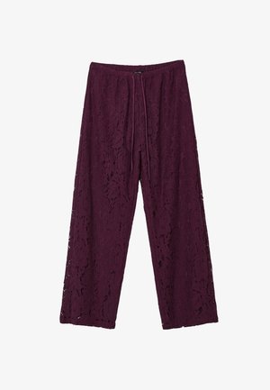 Pantalon en dentelle de couleur violet profond, avec une coupe évasée, une taille élastique avec cordon de serrage et un motif floral sur l'ensemble.