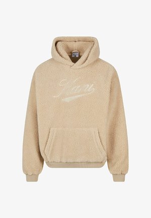 Bežinis pūkuotas džemperis su tekstūru, su gaubtu ir priekiu kišene. Ant jo yra išsiuvinėtas logotipas šviesesniame atspalvyje.