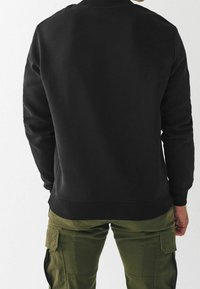 Next Sudadera - black