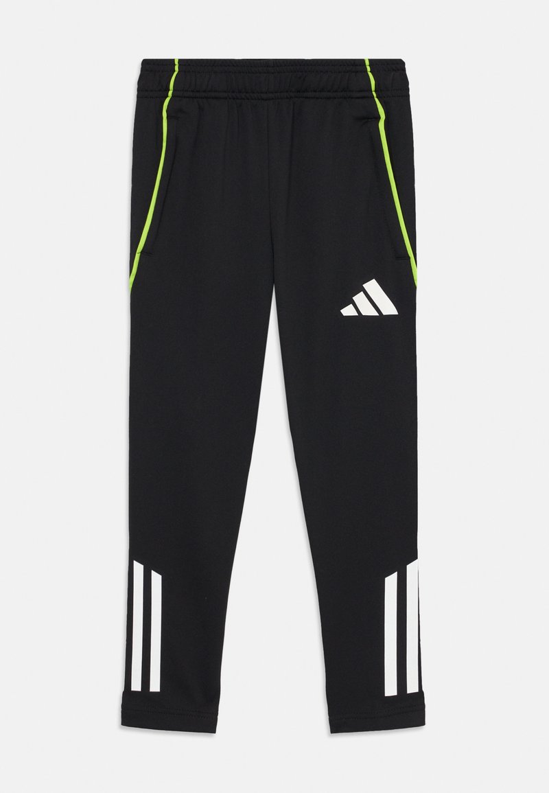 Zwarte sportieve broek van zachte stof, met contrasterende limoengroene zijstrepen en witte drie-strepen branding op de onderbenen.
