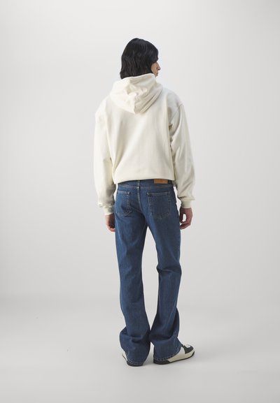 Filippa K Bootcut-farkut - washed mid blue