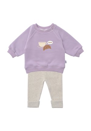 Purple sweatshirt with a graphic of a cup and croissant; paired with light gray leggings, featuring rolled cuffs. Soft fabric, casual design.