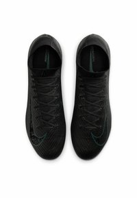 Scarpe sportive nere con una tomaia in maglia texturizzata, caratterizzate da un design con lacci neri e uno swoosh Nike verde su ciascun lato.