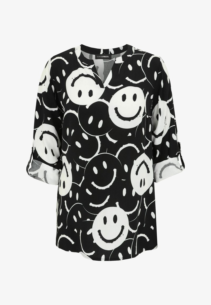 Black and white blouse with a v-neck, featuring a pattern of smiling faces. Made from soft fabric with three-quarter sleeves and roll-up cuffs.