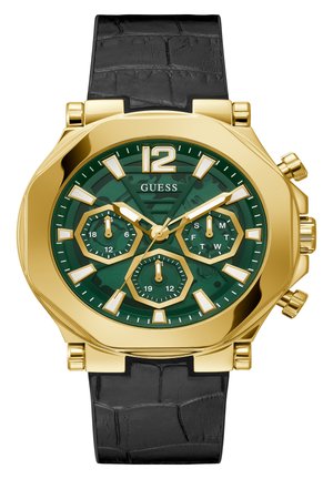 Montre chronographe en acier inoxydable doré avec un cadran vert, des sous-cadrans hexagonaux, un bracelet en cuir texturé noir et de grands marqueurs d'heure numériques.
