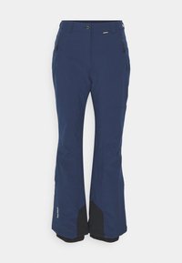 Marinblå skidbyxor med en slät yta, med en svart detalj vid bensluten, blixtlåsförsedda sidofickor och knappstängning i midjan.