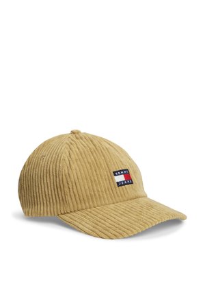 Бежова бейзболна шапка от корд с извита периферия и малко лого на Tommy Jeans на предната част.