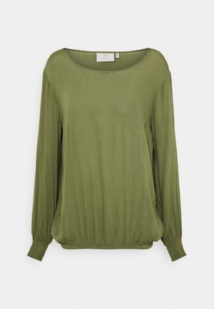 Blusa a manica lunga verde oliva con scollo a U, orlo e polsini elasticizzati, realizzata in tessuto morbido e leggero. Texture liscia.