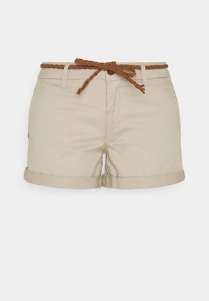 Beige cotton shorts with rolled hems and a braided brown belt at the waistband. Simple design with subtle stitching details.