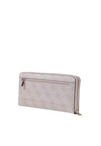Zip-around wallet in light pink with a patterned surface, featuring a front pocket, silver-tone hardware, and a textured finish.