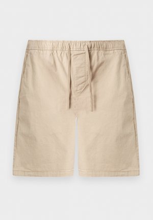 Bézs térd fölé érő rövidnadrág elasztikus derékpánttal és húzózsinórral, elöl zsebekkel, kényelmes szabással, sima fehér háttér előtt.