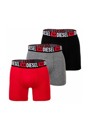 Black men's boxer briefs with a branded elastic waistband featuring "DIESEL" text in white and red logos.