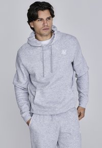 Gray fleece hoodie with a drawstring hood, white logo on the chest, ribbed cuffs, and a relaxed fit. Smooth texture and medium thickness.