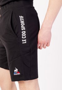 short le coq sportif femme argent