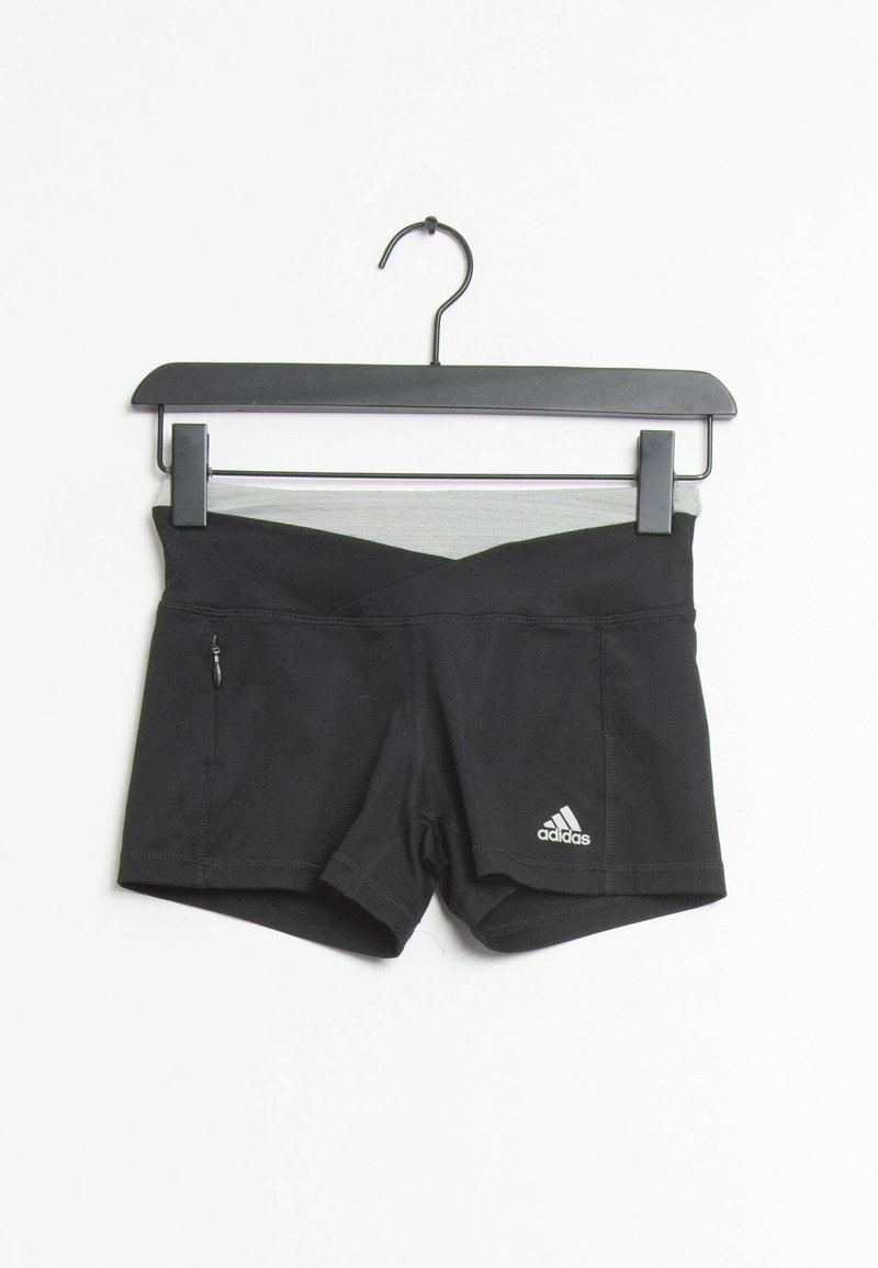 Shorts de sport noirs avec une large ceinture grise, dotés d'une poche zippée sur le côté gauche et d'un logo Adidas blanc en bas à droite.