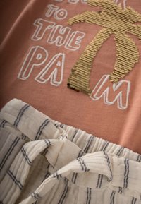 Cigit SET - Trousers - salmon