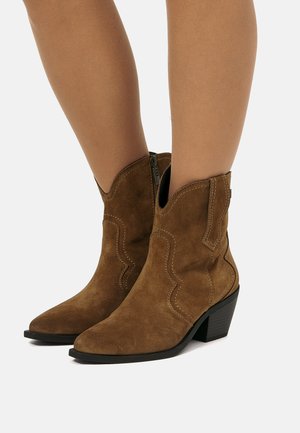 Botines camperos - marron
