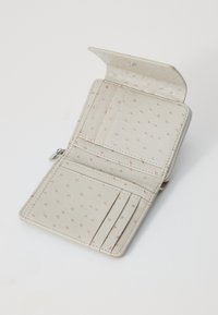 Light gray leather wallet featuring a textured pattern with small dots, multiple card slots, and a zippered compartment.