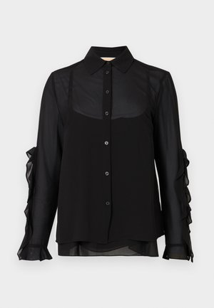 Melna blūze ar apkakles kaklu, pogām priekšā un caurspīdīgām garām piedurknēm ar viļņotām detaļām. Gluda tekstūra, viegla auduma.