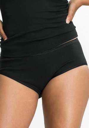 Black cotton hipster briefs featuring a smooth texture, low-rise design, and an elastic waistband, showcasing a seamless finish.