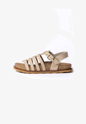 Sandalo in pelle beige con cinque cinturini, fibbia regolabile, sottopiede in sughero e suola in gomma, mostrato di profilo su sfondo bianco.