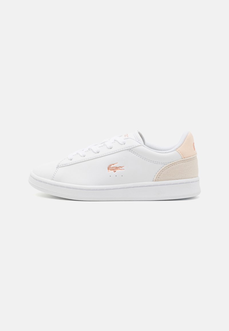 White leather sneakers with a light pink suede accent, featuring a lace-up design and a stitched toe cap. Lacoste logo in rose gold detail.