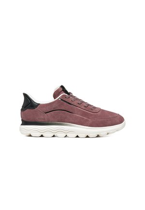 Casual low-top sneaker in dusty rose suede with black heel accent and white thick, textured sole viewed from the side.