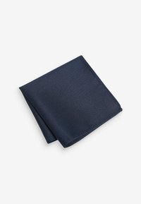 Navy pocket square made from textured fabric with a diamond pattern, folded neatly in quarters, featuring a smooth finish.