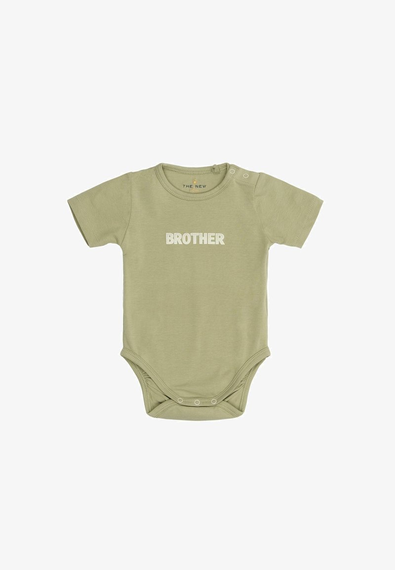 Žalias kūdikio bodis trumpomisRankovėmis, pagamintas iš minkštos medvilnės. Ypatybė: "BROLIS" baltai atspausta priekyje. Spaudžiamieji mygtukai petyje.