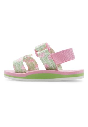 Flerfärgad sandal med gröna och rosa remmar med blommönster, en tjock rosa sula och gröna detaljer på botten för grepp.