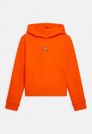 Sweat à capuche court orange vif à manches longues avec un petit logo Jumpman noir et blanc sur la poitrine, centré sous la capuche.