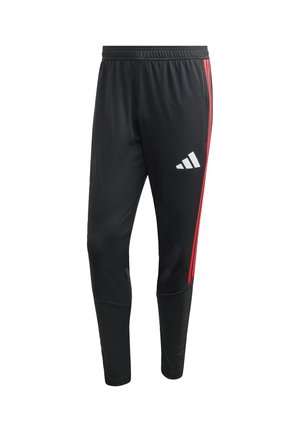 Black athletic pants featuring red side stripes, an elastic waistband, and textured lower panels. Includes a white logo on the thigh.
