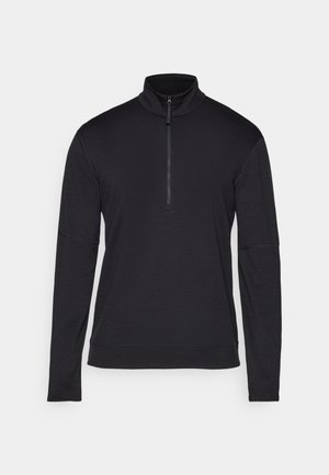 Schwarzer Langarm-Pullover mit einem Reißverschlusskragen, aus weichem Material gefertigt, mit flachen Nähten und einer entspannten Passform für mehr Komfort.