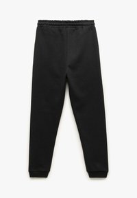 Sorte sweatpants med elastisk talje, tapered ben og ribbede manchetter. Fremstillet af blødt, tekstureret stof uden synlige mønstre.