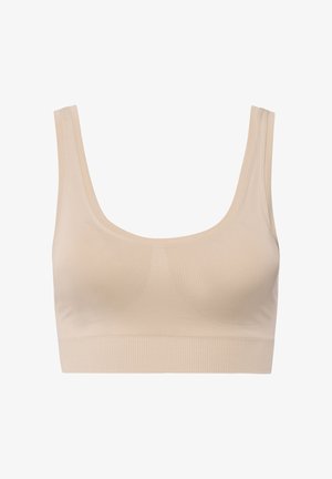 Béžová bezdrátová podprsenka s širokými ramínky, žebrovaným spodním lemem, hladkým povrchem a konturovanými švy pro podporu. Bez zapínání nebo zdobení.
