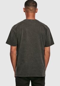 Merchcode TIME TO BLOOM - ACID WASHED HEAVY - T-shirt print - black