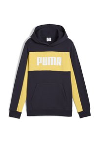 Tamsiai mėlynas treninginis džemperis su geltona krūtinės juosta, dideliu baltu "PUMA" logotipu, priekinė kišenė, reguliuojama kapišoninė. Minkštas medvilnės mišinio audinys.