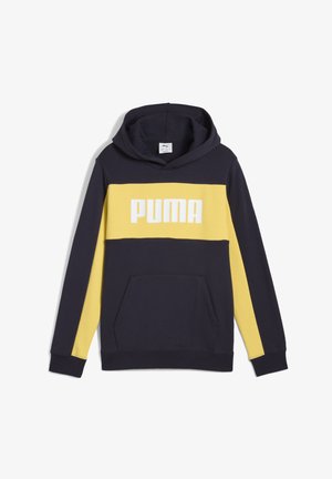 Mörkblå hoodie med gul bröstband, stor vit "PUMA"-logga, framficka och justerbar dragsko i huvan. Mjuk bomullsblandning.