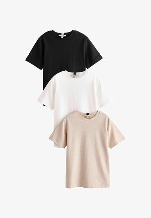 Three short-sleeve t-shirts stacked: black, white, and beige. Made of cotton, featuring crew necklines and relaxed fits. Smooth texture.