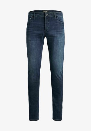 Dunkelblaue Denim-Jeans mit schlanker Passform, fünf Taschen und einem Knopfverschluss. Mit dezenten Verwaschungen und tonaler Naht. Keine sichtbaren Verzierungen.