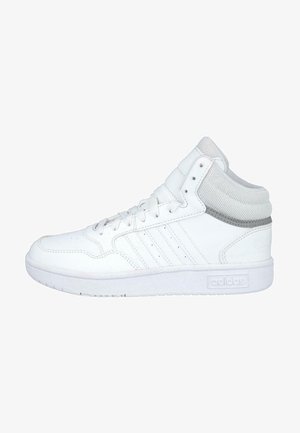White high-top sneaker made of leather with a textured mesh ankle, featuring three stripes, a rubber sole, and silver accents.