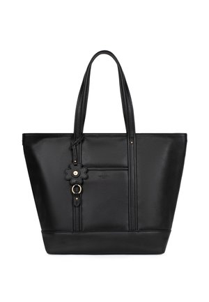 Zwarte leren totebag met dubbele handvatten, voorkantzak en decoratieve bloemensieraad met gouden ringdetail.