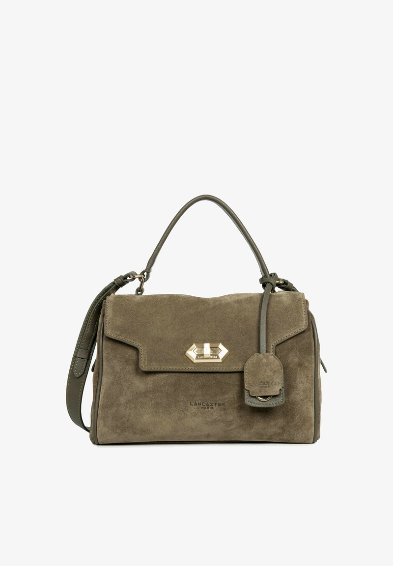 Sac à main en daim taupe avec poignée supérieure, bandoulière ajustable, fermoir doré et étiquette frontale embossée avec "Lancaster Paris."