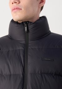 Calvin Klein PUFFER - Dunjakker - black