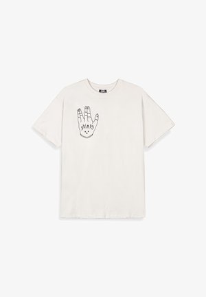 Cremefarbene Baumwoll-T-Shirt mit einem schwarzen Umrissgrafik einer Hand und Designelementen. Kurze Ärmel und Rundhalsausschnitt.