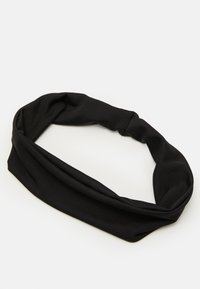 Black fabric headband with a smooth, stretchy texture. Features a twisted design at the front and a wide band for comfortable wear.