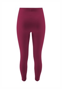 Bordowe legginsy o ribbowanej fakturze i wysokim stanie, z dopasowanym krojem, który zwęża się przy kostkach.