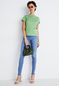 Levi's® Tričko s potlačou - green
