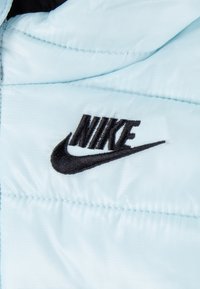 Nike Sportswear SOLID SNOWSUIT UNISEX - Vinterdress - glacier blue