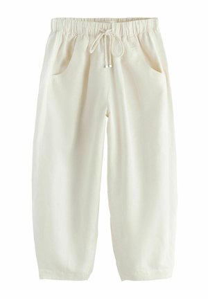 Cream-colored loose pants with elastic waistband and drawstring, featuring front pockets and a relaxed fit.